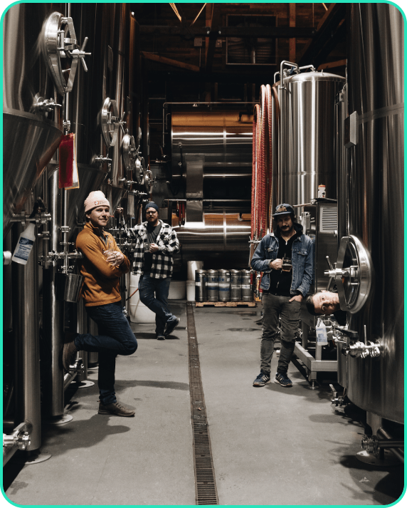 group of people drinking beer in the brewhouse