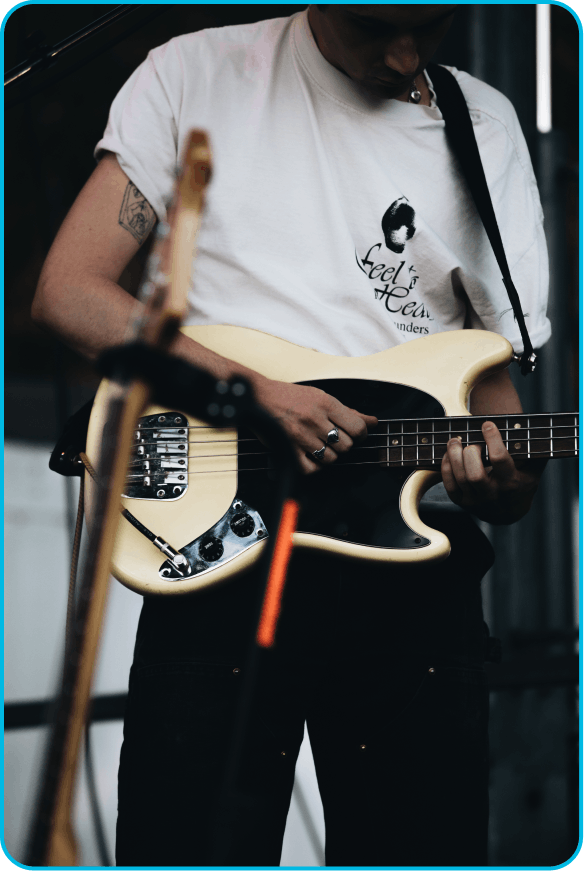 FAQ3 man playing guitar