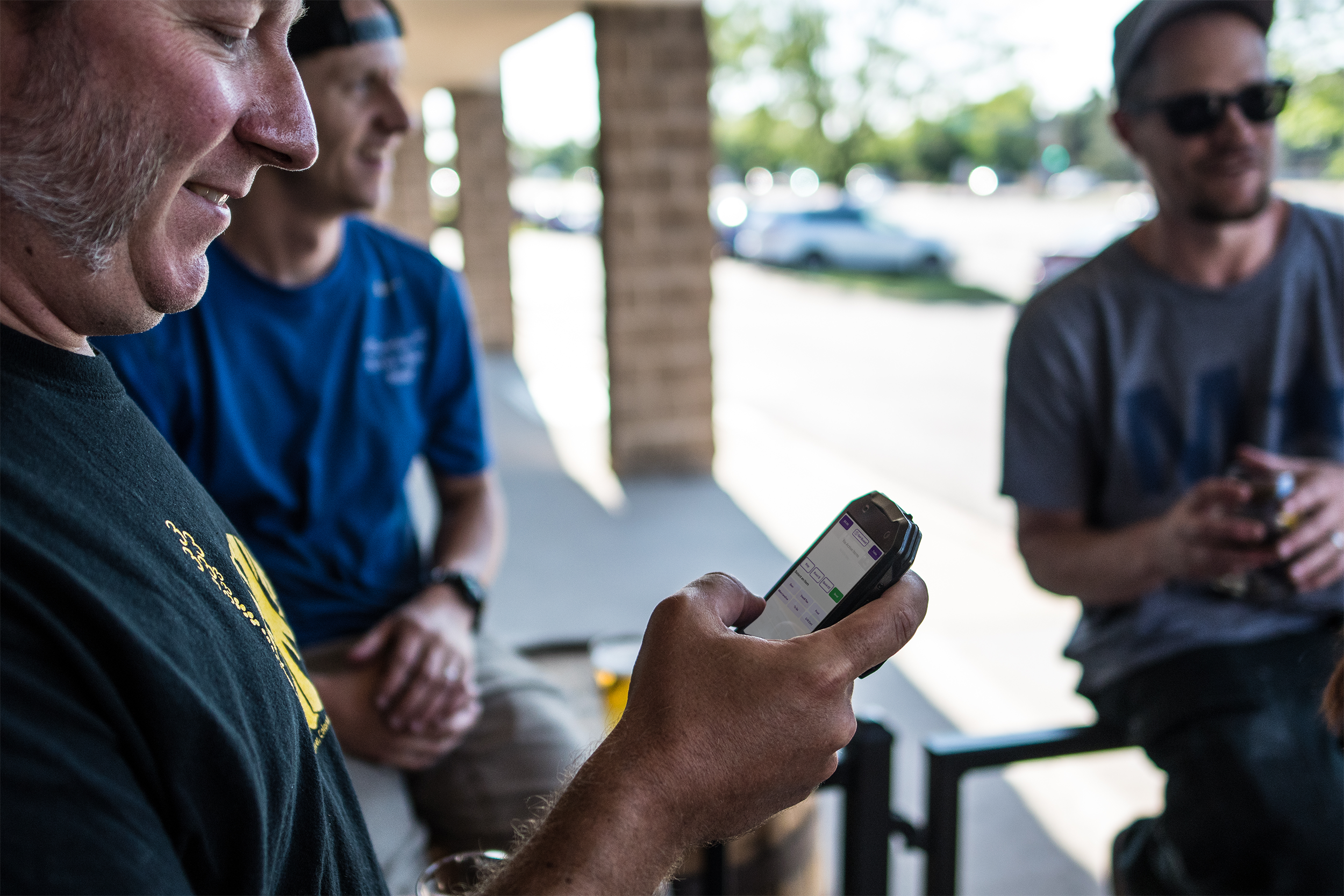 A guest uses he BevFinder on their phone at a taproom