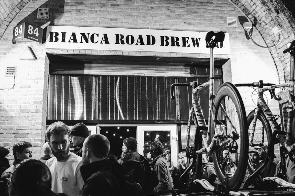 Photographer Bikes and people outside of the brewery