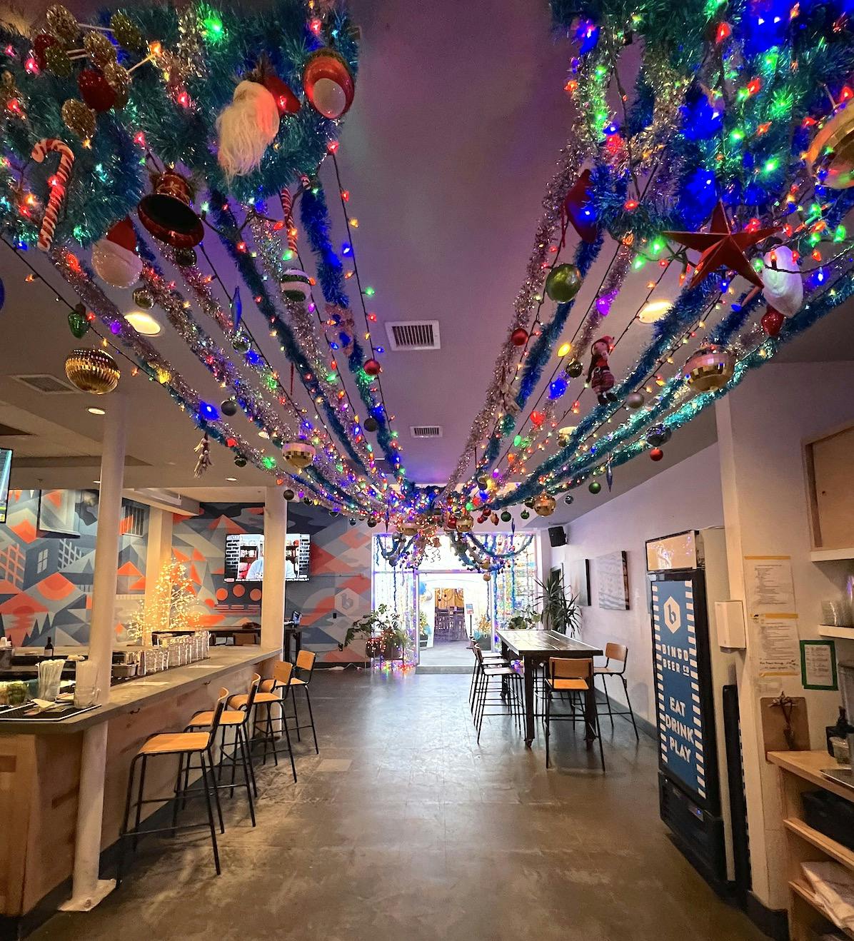 a Photo of holiday decorations on the ceiling of bingo