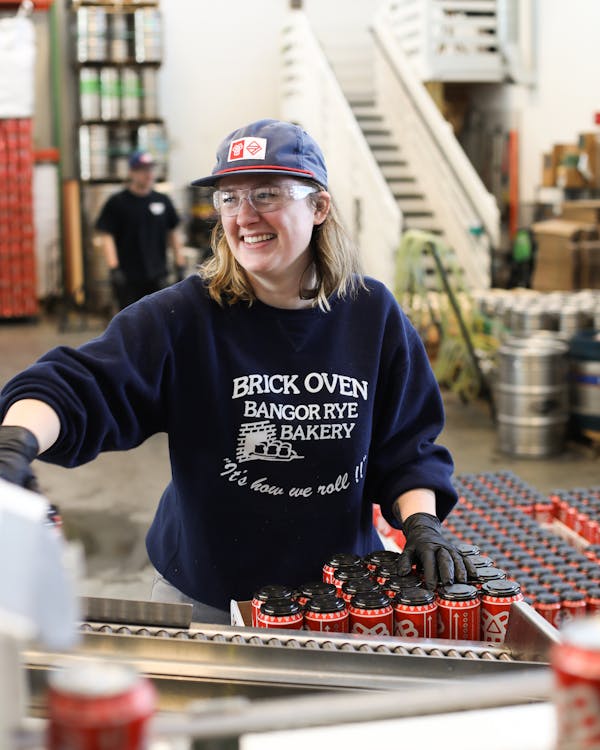 MarleeCanningLineReciprocal_11_14_19 Person working the canning line