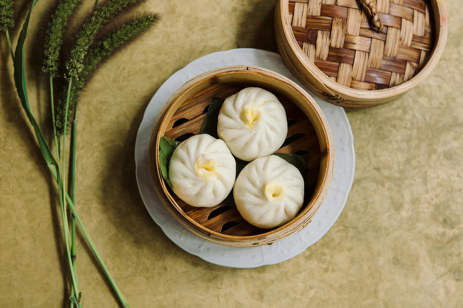 bamboo dish of steam buns