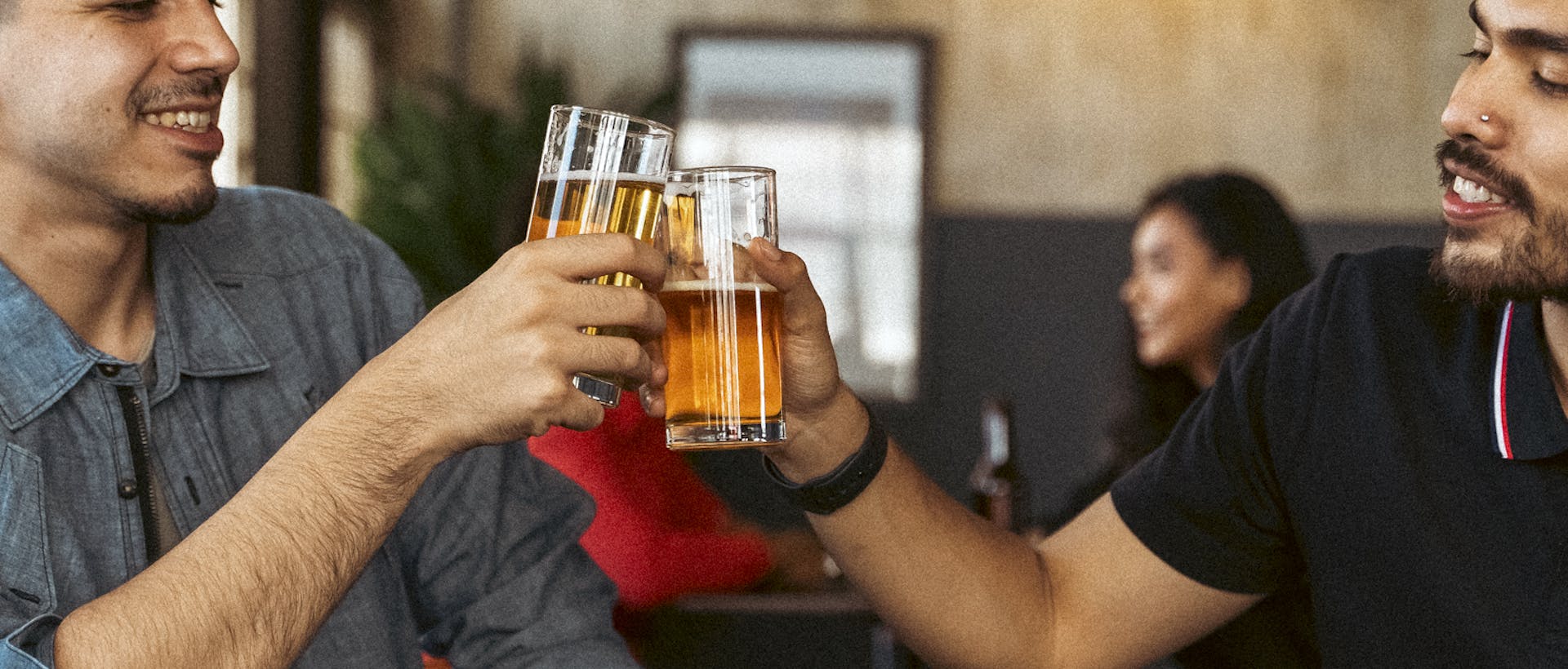 Two men enjoying pints of beer