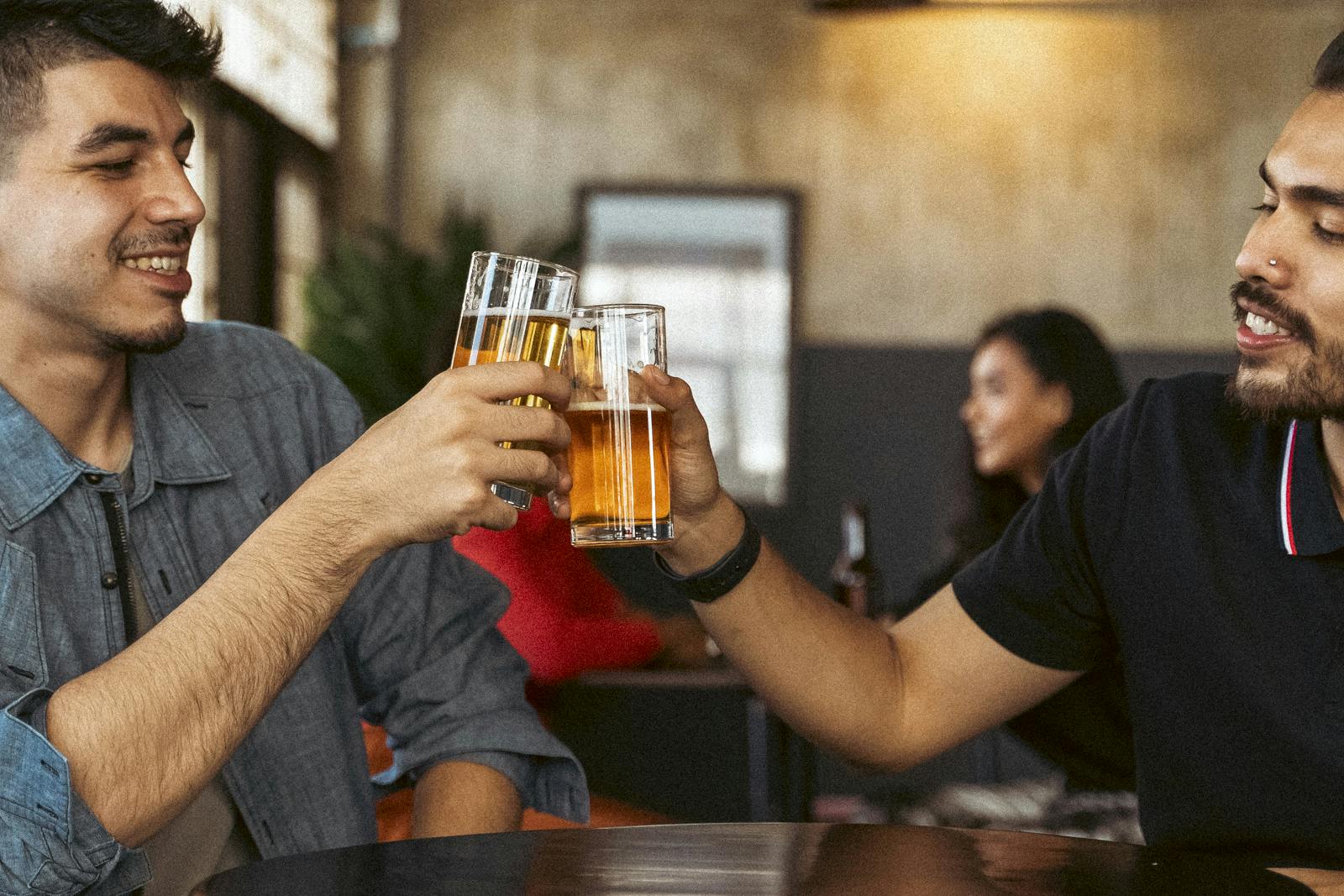 Two men enjoying pints of beer