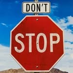 Don't Stop band logo: a red stop sign
