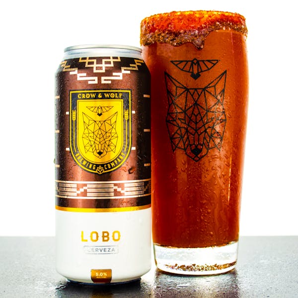 michelobo A glass and can of the michelobo beer