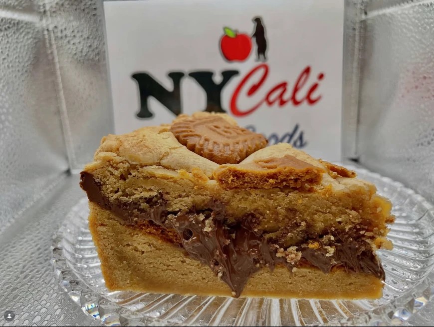 NYCali Baked Goods: a thick cookie bar layered with chocolate and topped with a Biscoff cookie
