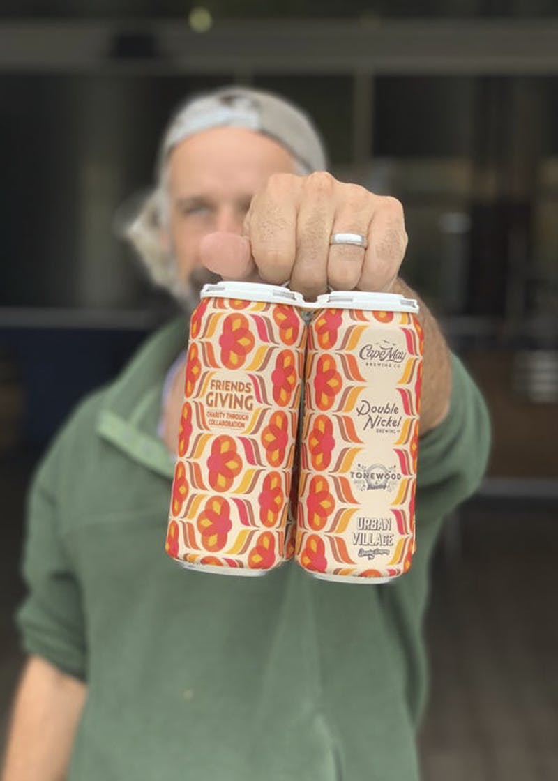 Double Nickel friend giving beer