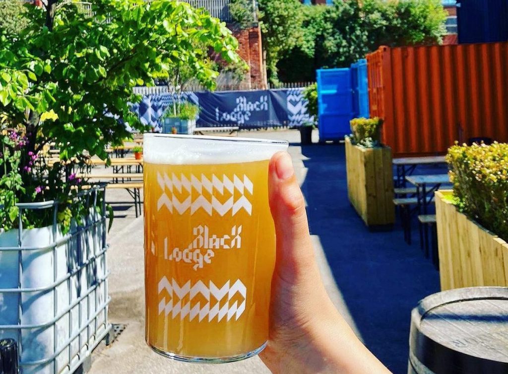 black-lodge-brwery-pint-of-beer-in-hand-e1653482695214-1024x753