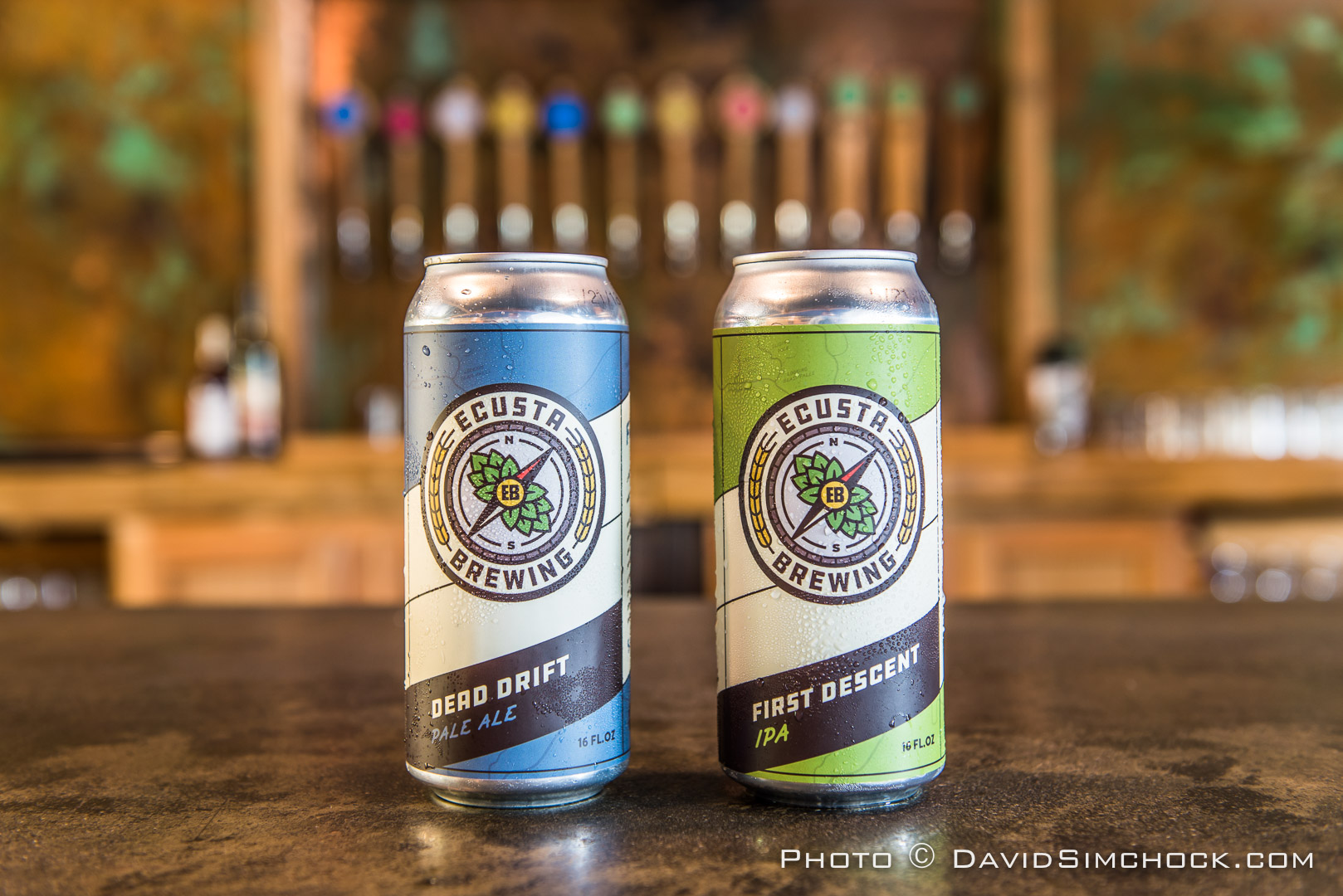 two cans of beer side by side