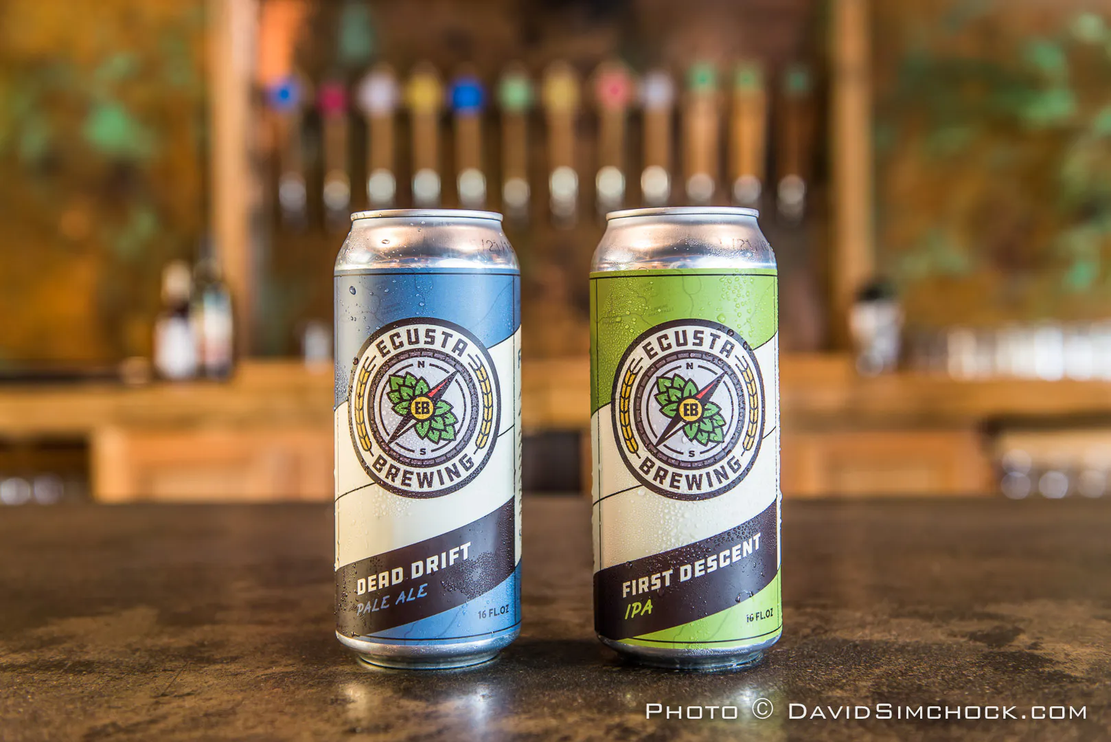 two cans of beer side by side