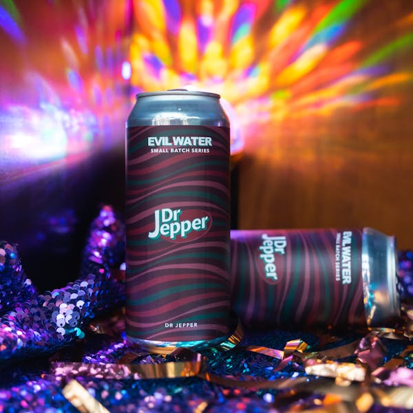 can of seltzer with disco lights in background