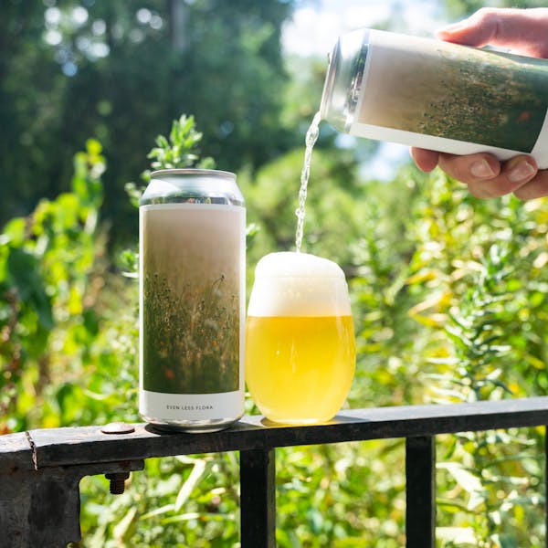 beer in glass in grass