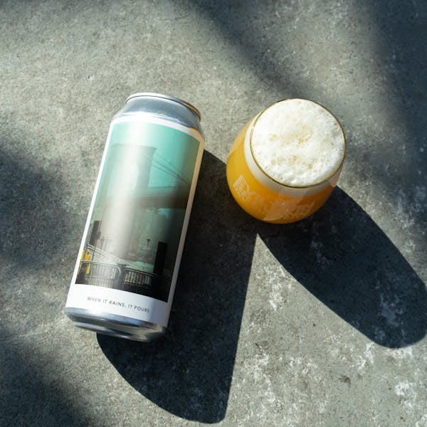 triple ipa on concrete with can