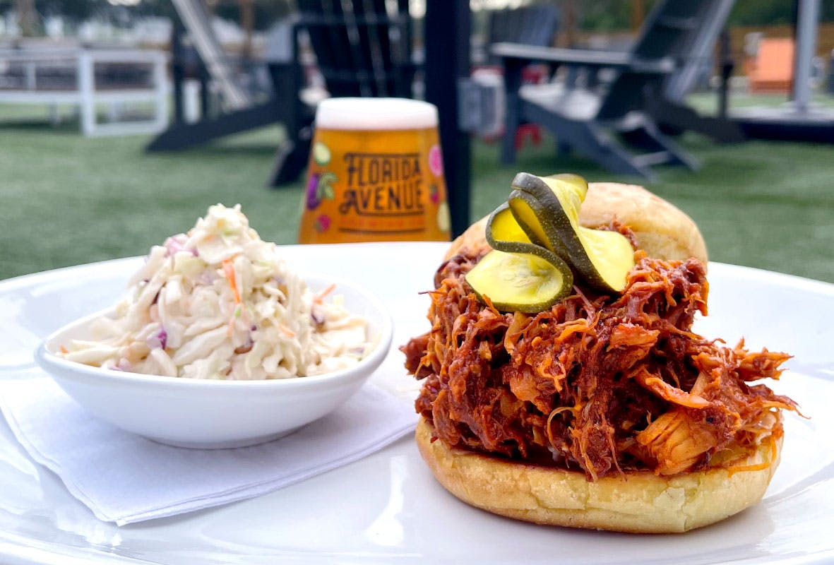 Slow cooked shredded chicken, tossed in house-made Brown sugar BBQ, coleslaw, house-made zucchini pickles on a toasted potato bun