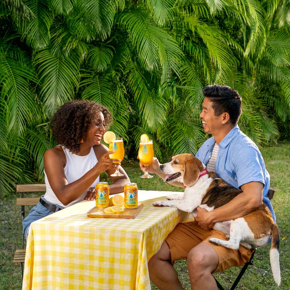 Customers drinking Funky Buddha Floridian Wheat Beer