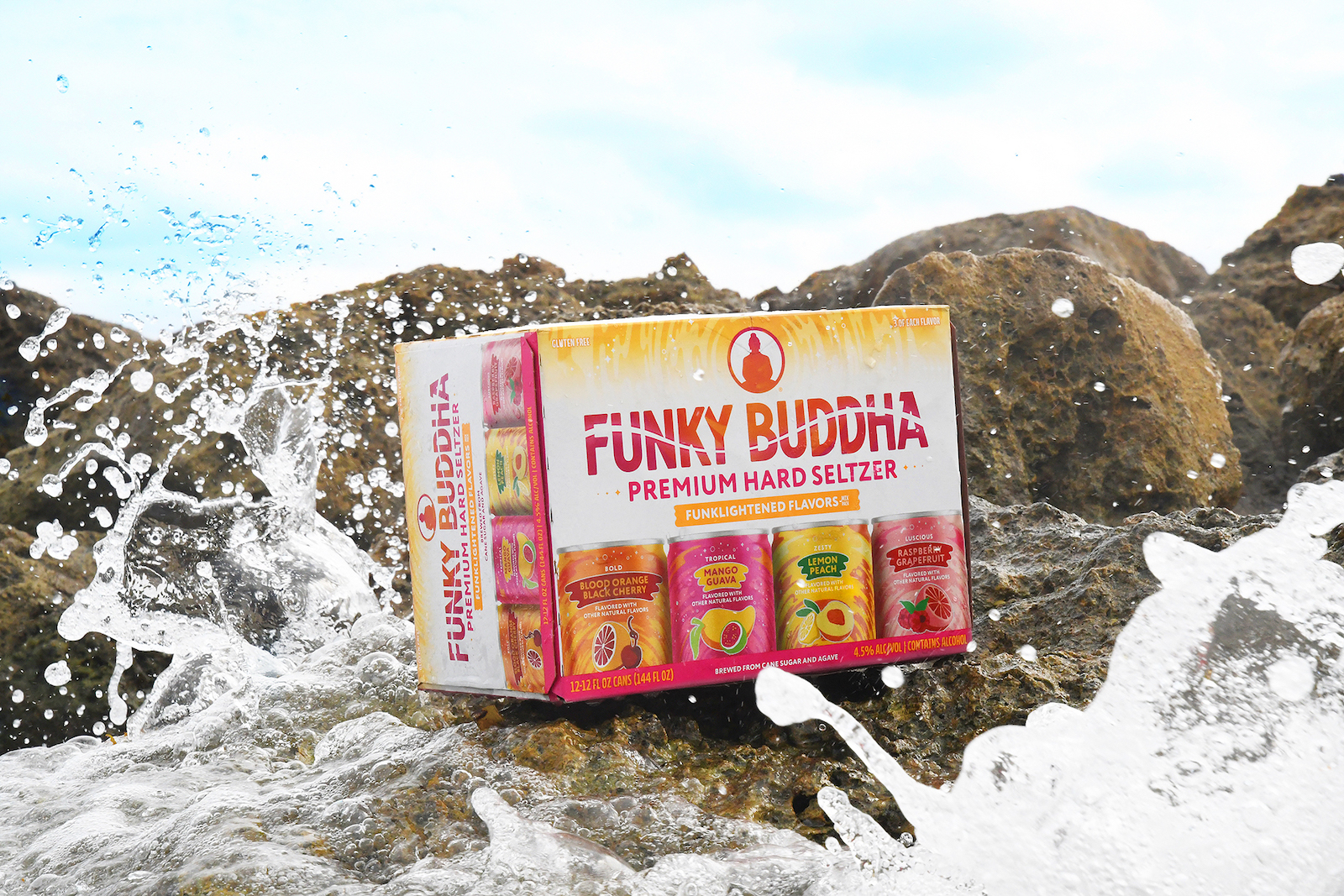 Funky Buddha hard seltzer box on the beach
