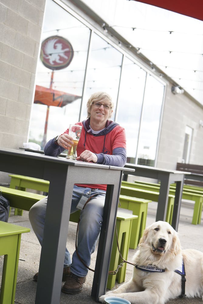 Photographer Griffin Claw Community event leader dogs for the blind