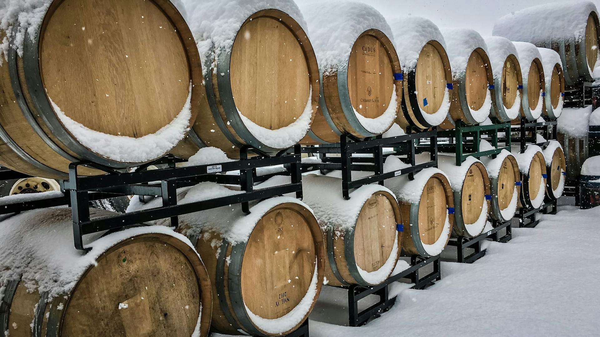 Barrels covered in snow