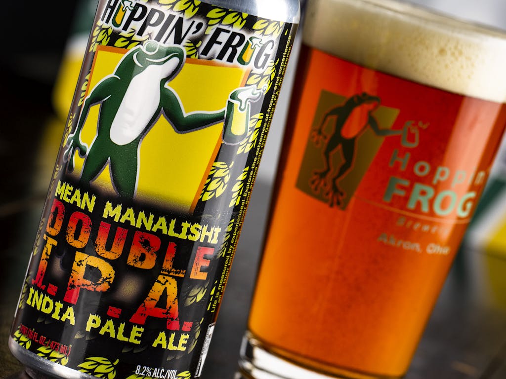 HF_Mean Manalishi Double IPA_single can with glass close up and tilt_2022_copy