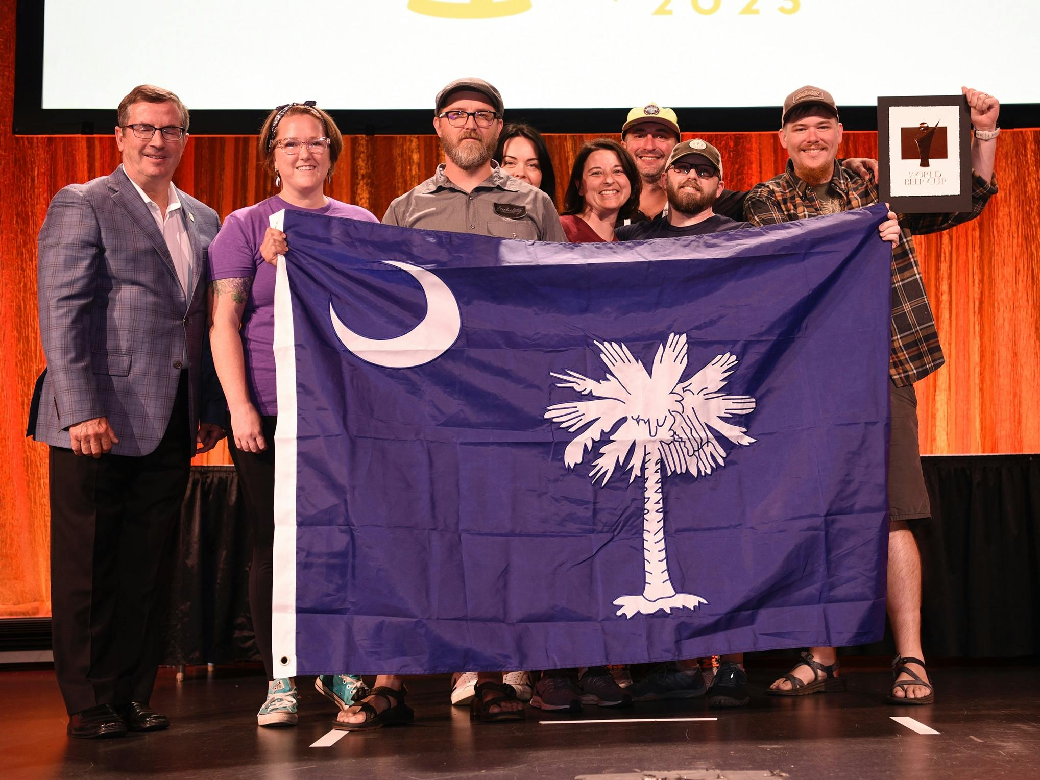 group picture with south carolina flag