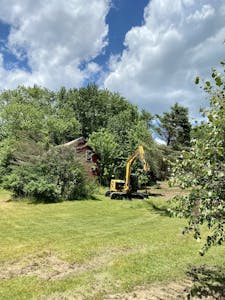 Picture of old barn and work clearing land