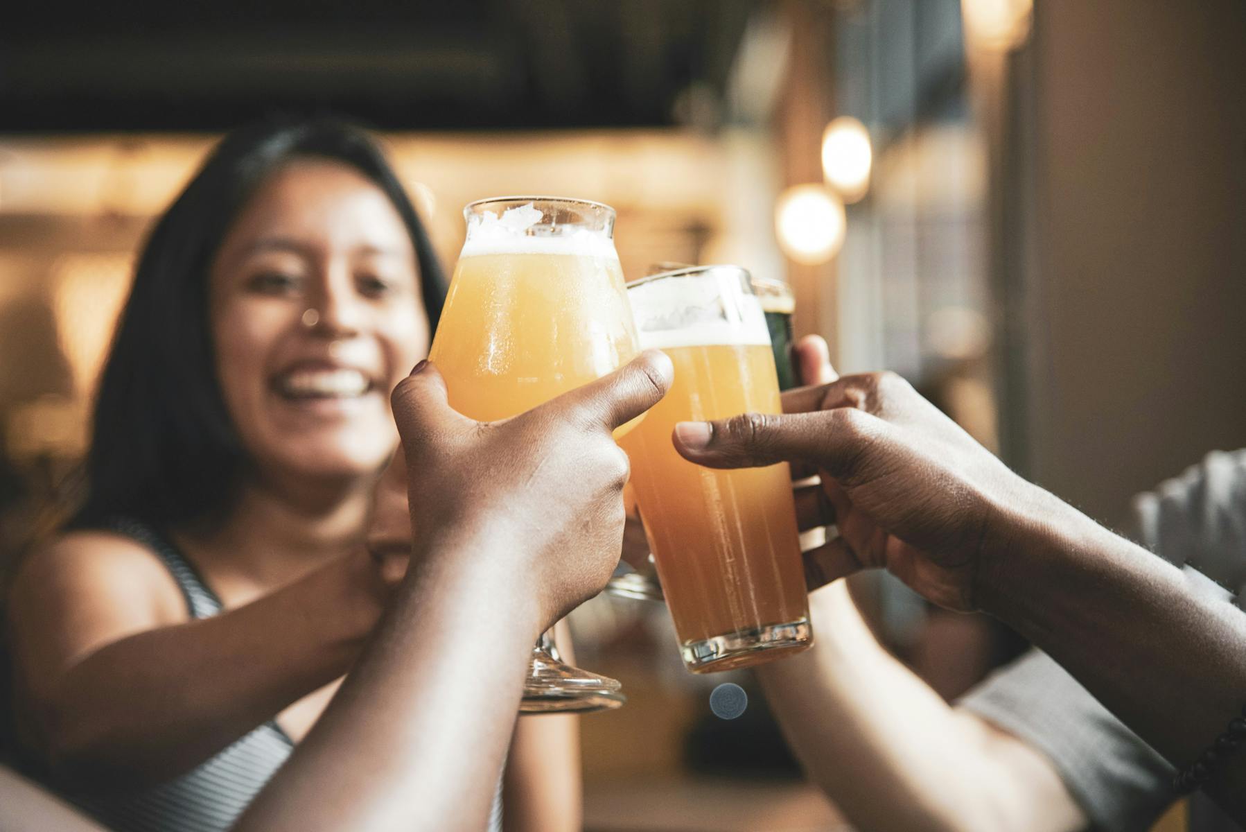 Photographer Cheer-sing with Pangaea draft beer in a glass