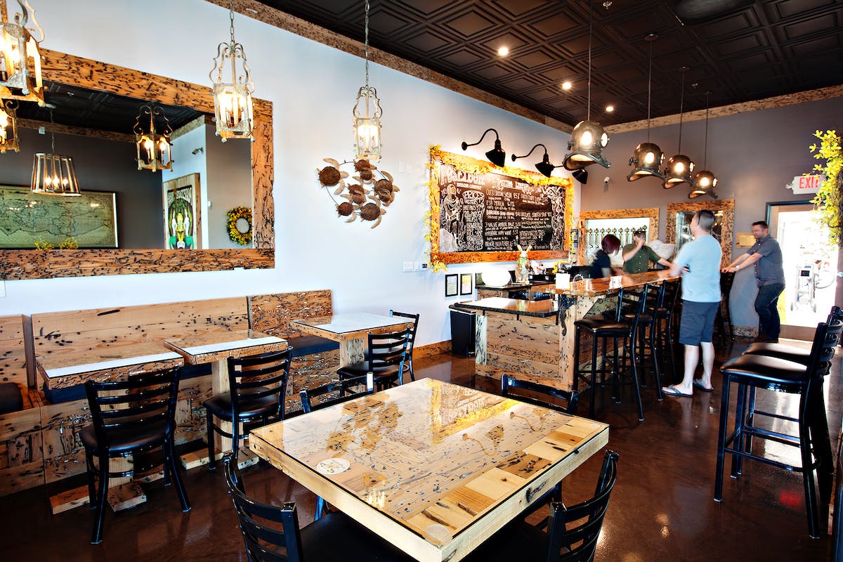 DavyJones-possibleAlternative-2 A small, well-lit taproom with patrons ordering beers at a bar