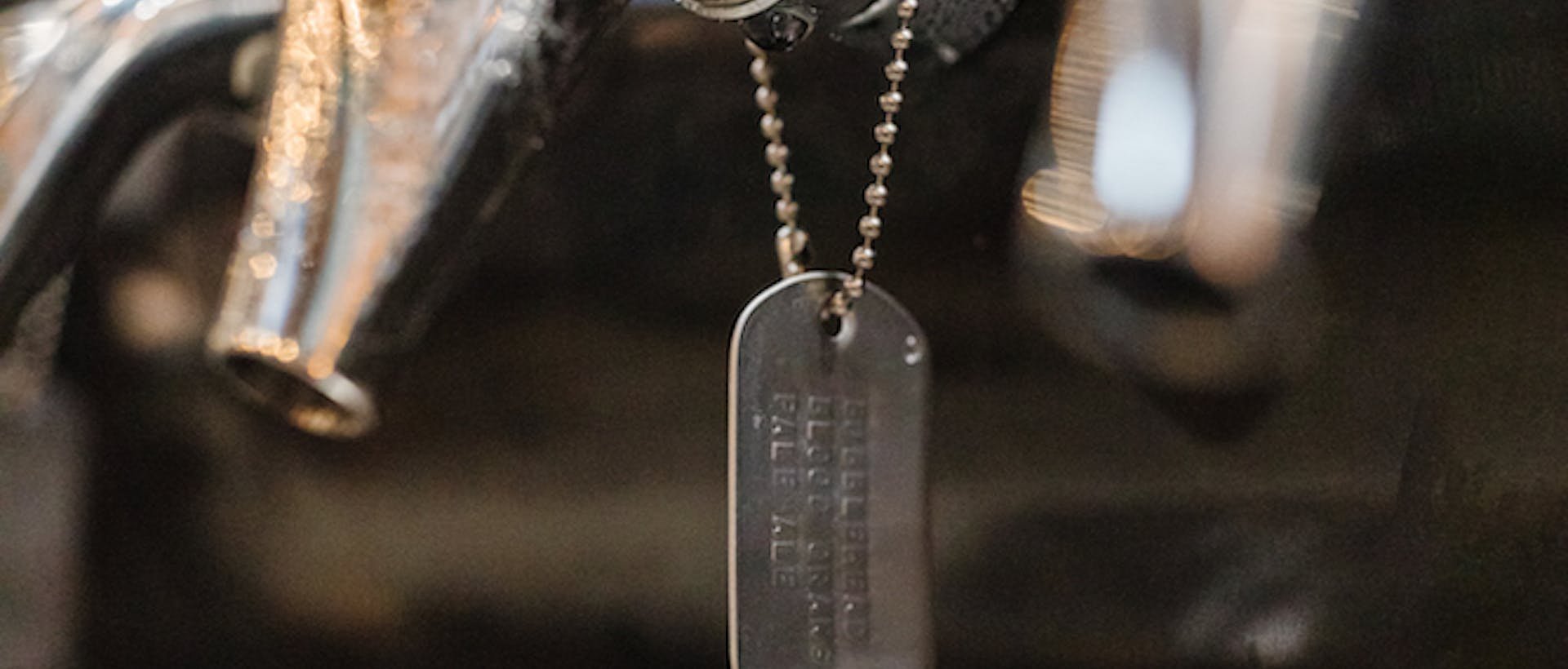 Beer tap adorned with military dog tag