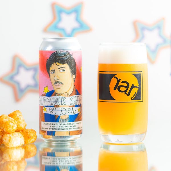 Glamour_Shots_By_Deb Glass of RaR Beer next to a 16 oz. can