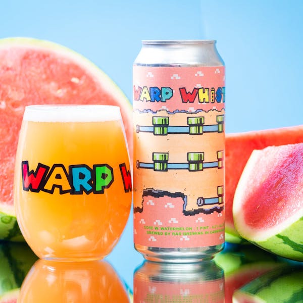 Glass of RaR beer with 16 oz. can with watermelon