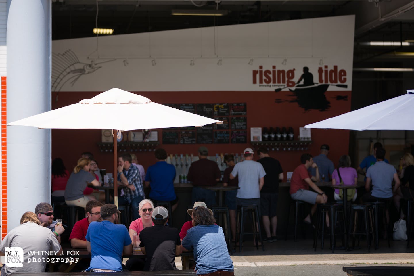 Rising Tide Brewing Company spring photo shoot at the tasting room on Fox Street in Portland's East Bayside neighborhood.  The artisanal craft brewery offers beer in an airy tasting room, plus live music, food trucks & tours.  According to the Maine Brewe