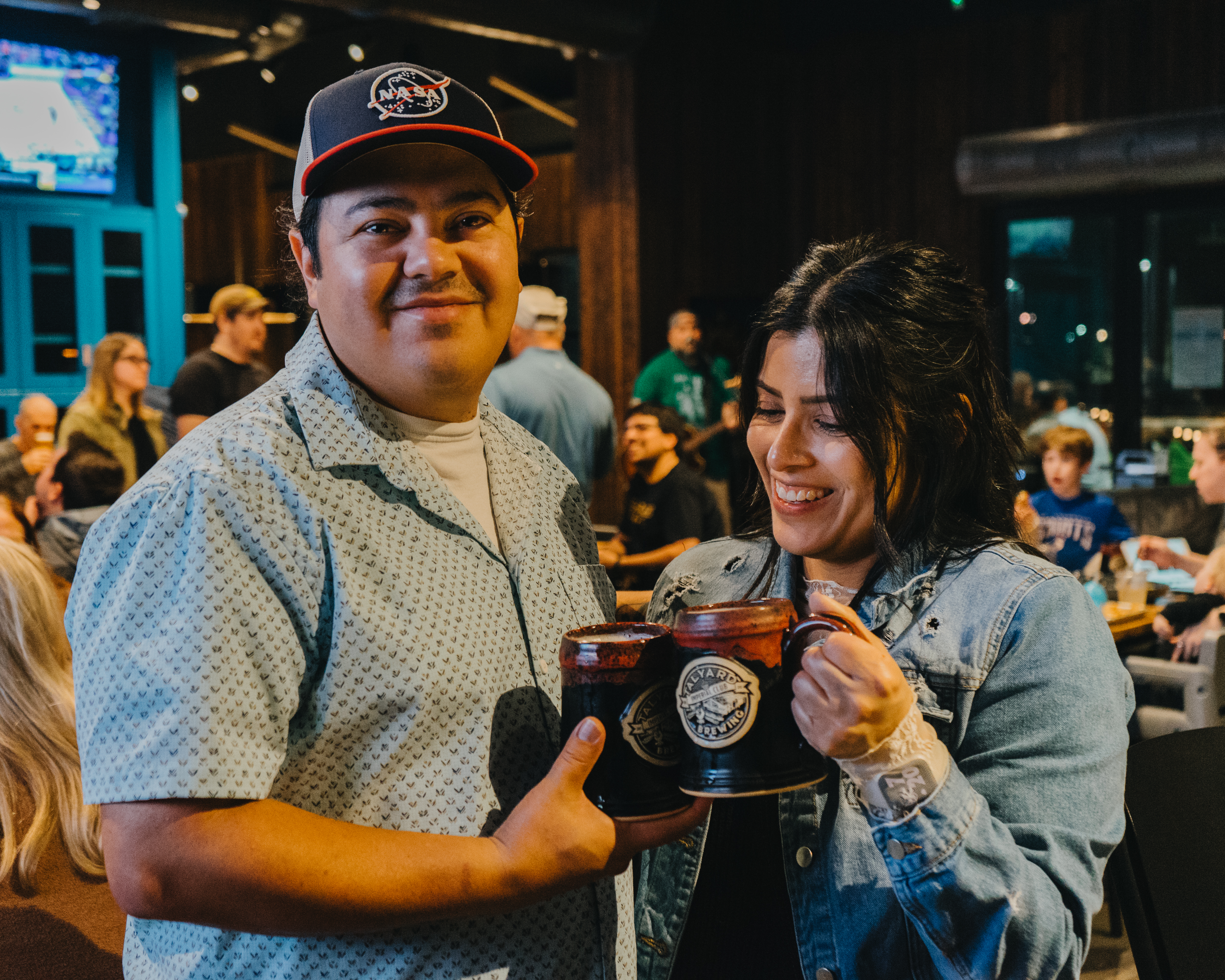 couple cheers inside