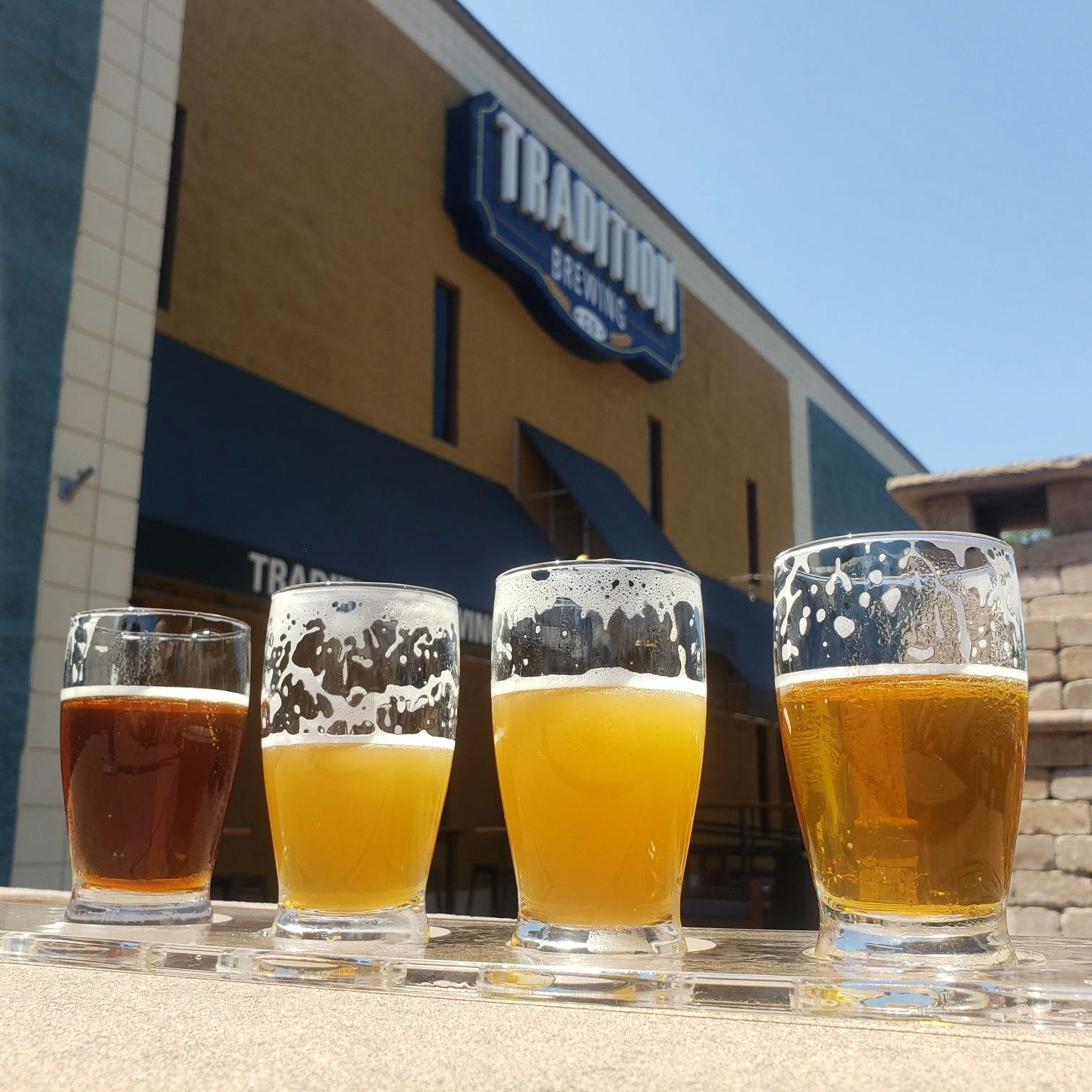 Three Traditional brewing beers lined up on a table 